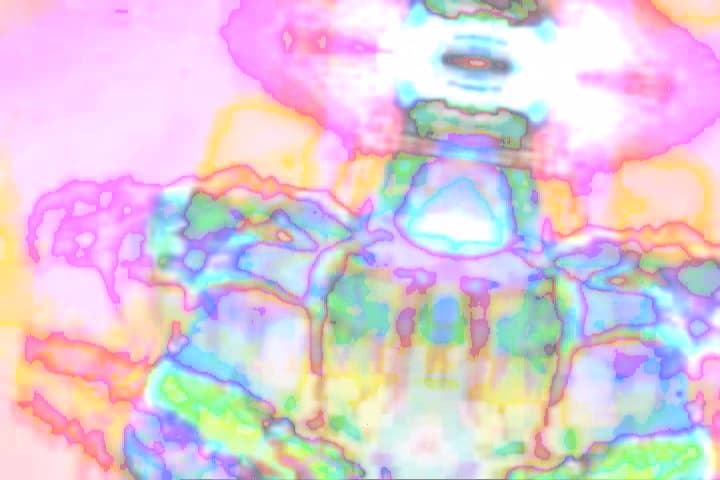 Angel Remix: Light
Video still
In this video still image, the ethereal light and layered digital textures converge to form an otherworldly figure, suggestive of an angelic, or perhaps alien presence. Through its futuristic sensibility and integration of digital aesthetics, this visual artwork proposes alternative modes of representation that merge archetypal iconography with interdisciplinary art production. The artwork situates itself at the intersection of ancestral memory or modes of perception, contemporary ritual, and technology, contributing to an expanded dialogue on the boundaries of human consciousness and representation.